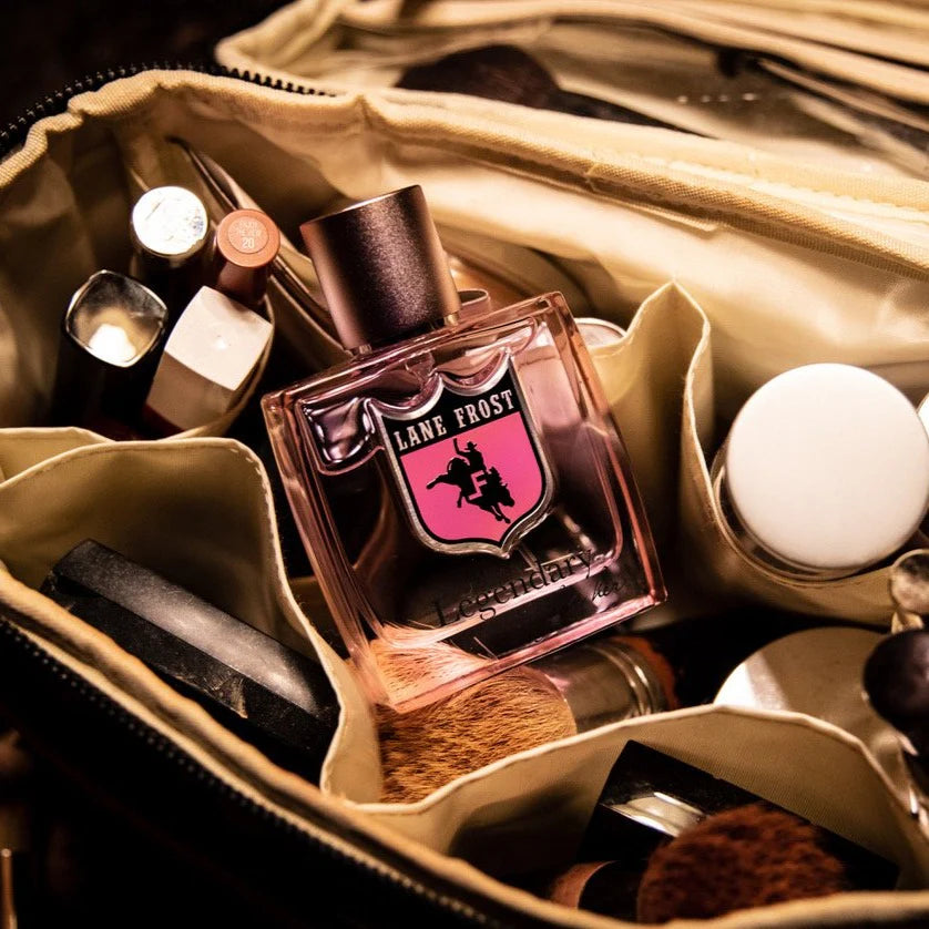 Lane Frost perfume bottle in makeup bag
