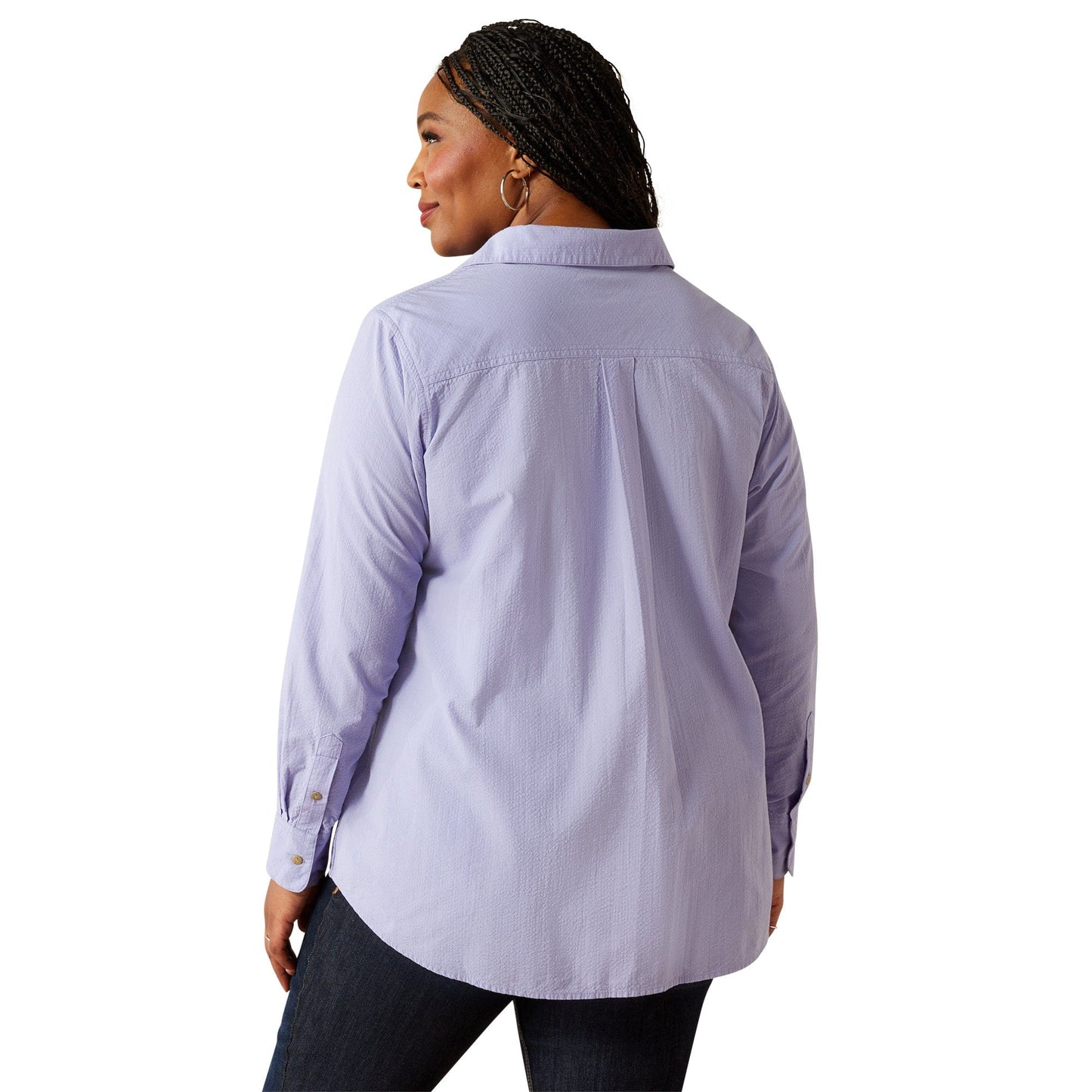 Woman wearing a lavender back-plus shirt.