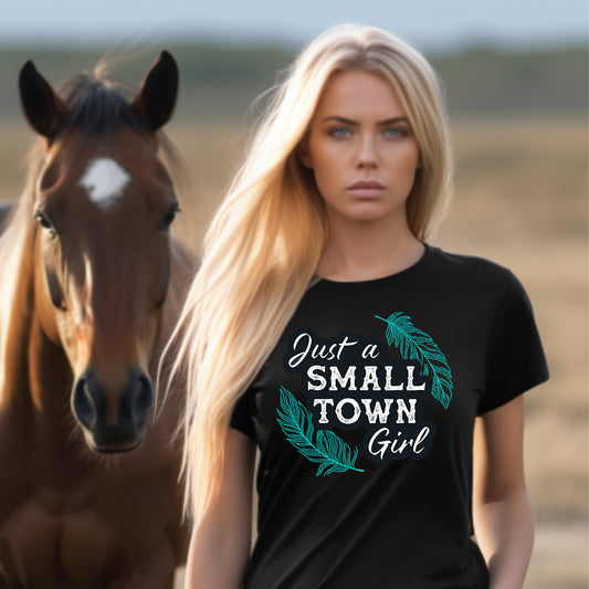 Woman in Small Town Girl shirt with horse
