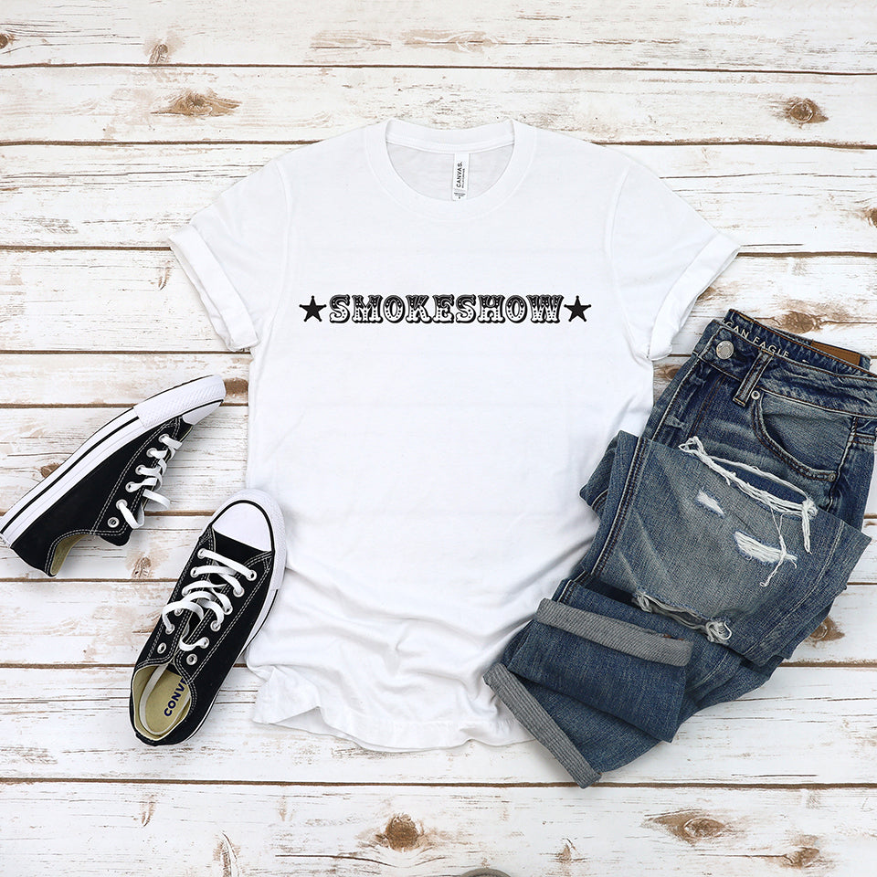 Smokeshow graphic tee flat lay with jeans and sneakers