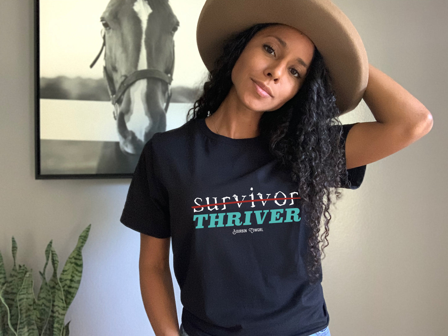 Woman wearing Survivor Thriver tee shirt