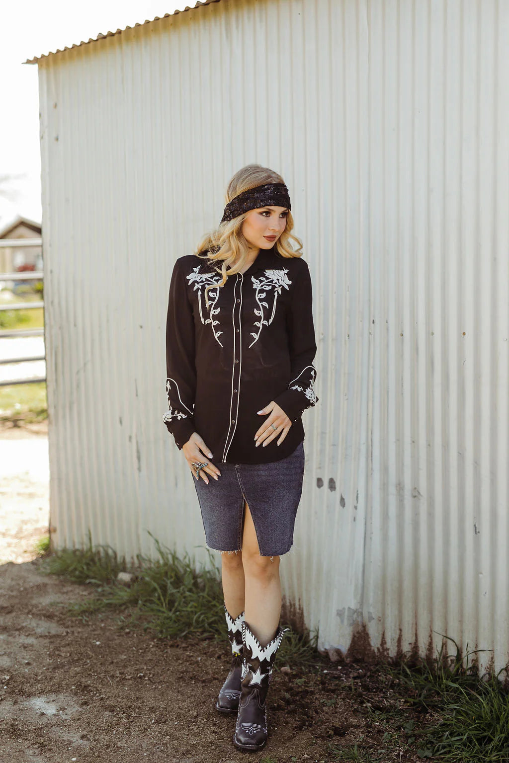 Western Wildflower black shirt and denim skirt.