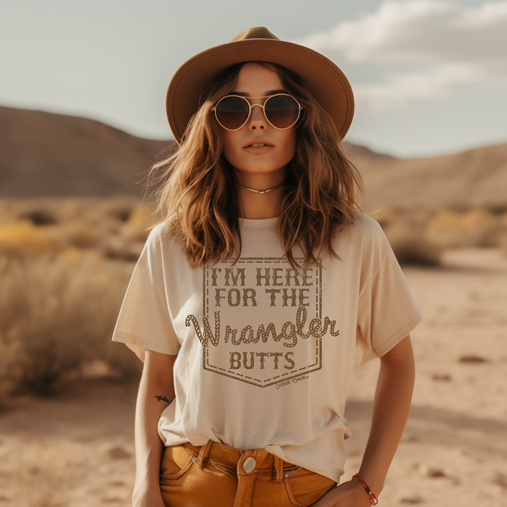 Woman in Wrangler Butts cream shirt