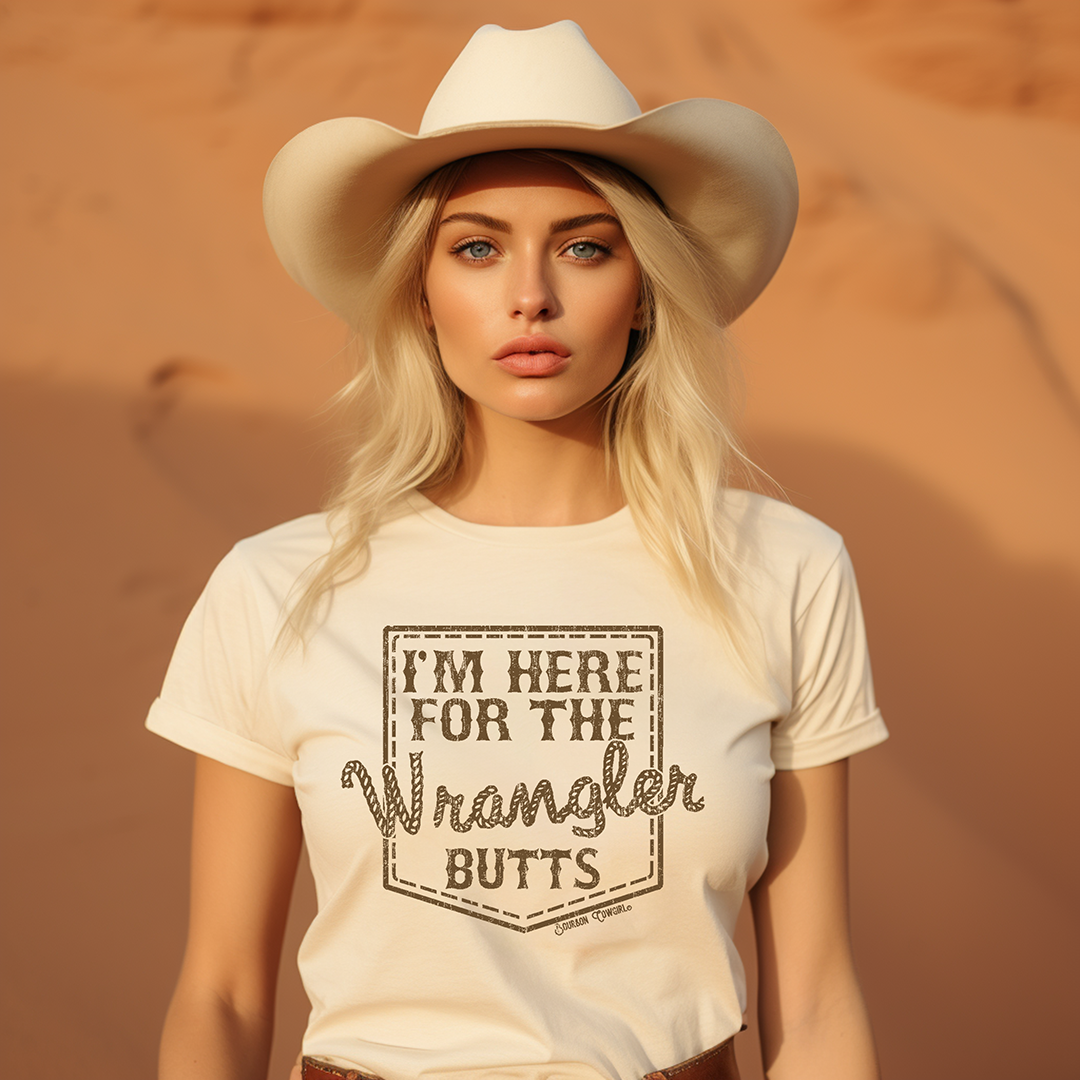 Woman in Wrangler Butts cream tee & cowboy hat