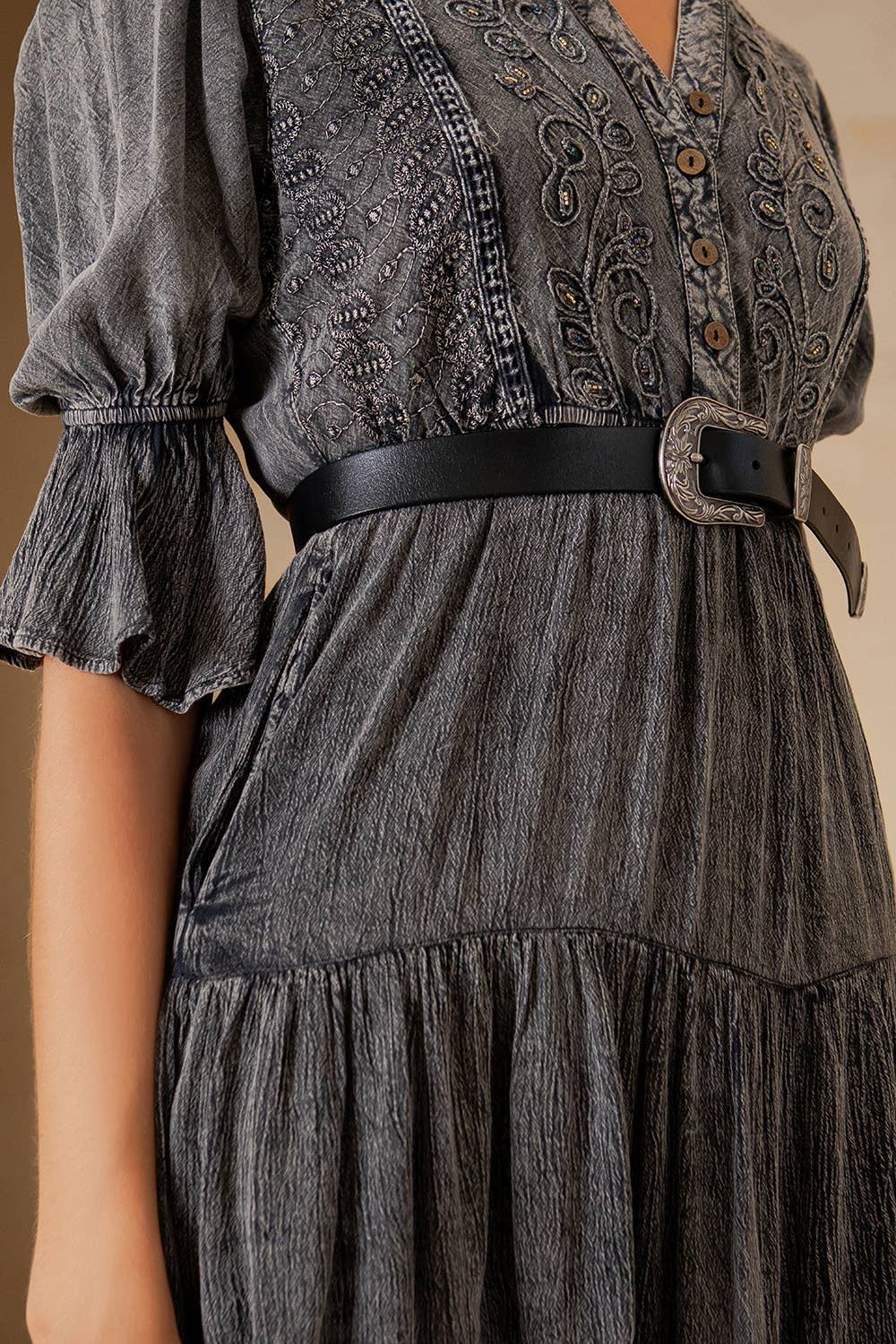 Gray dress with black belt.