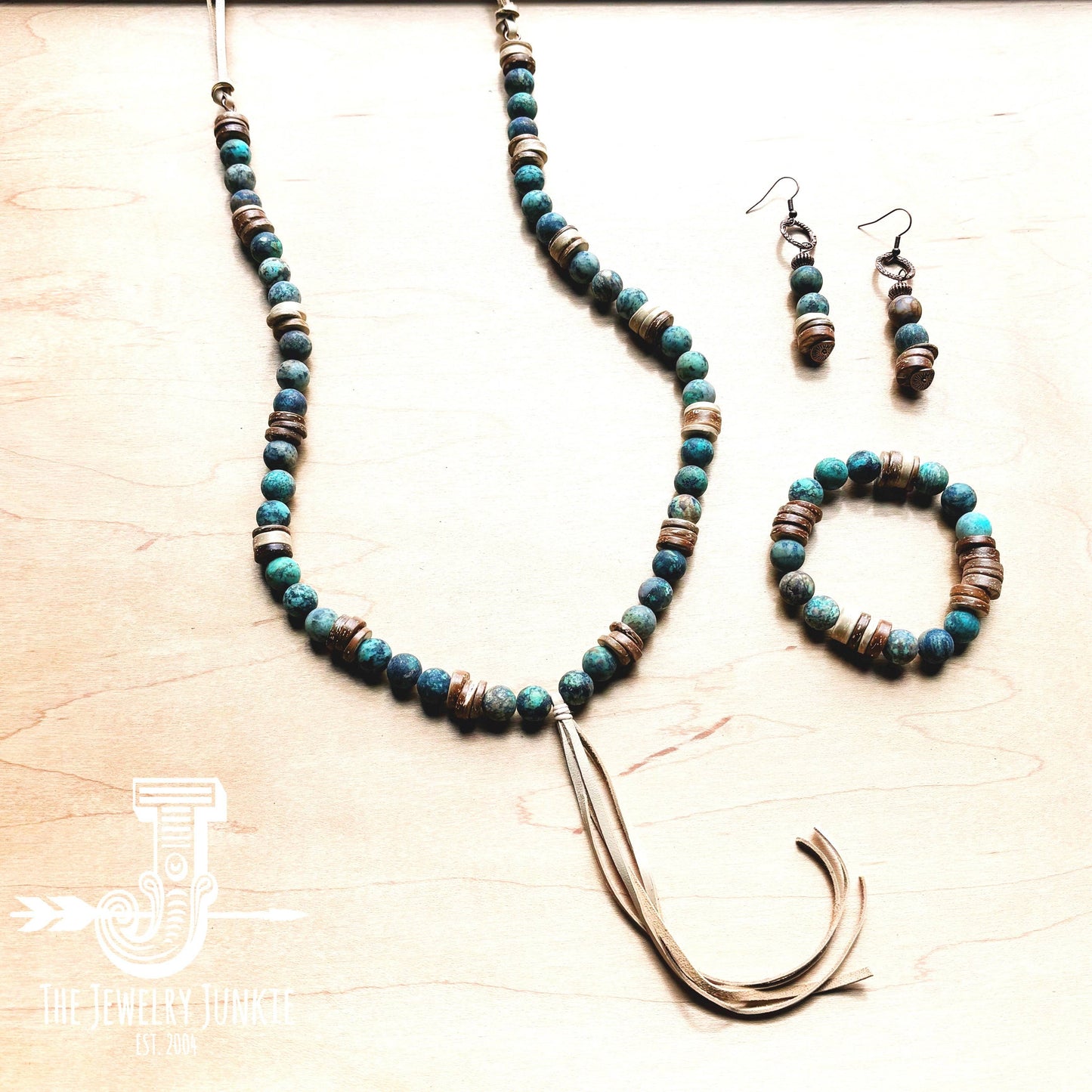 Beaded necklace, bracelet, and earrings set.