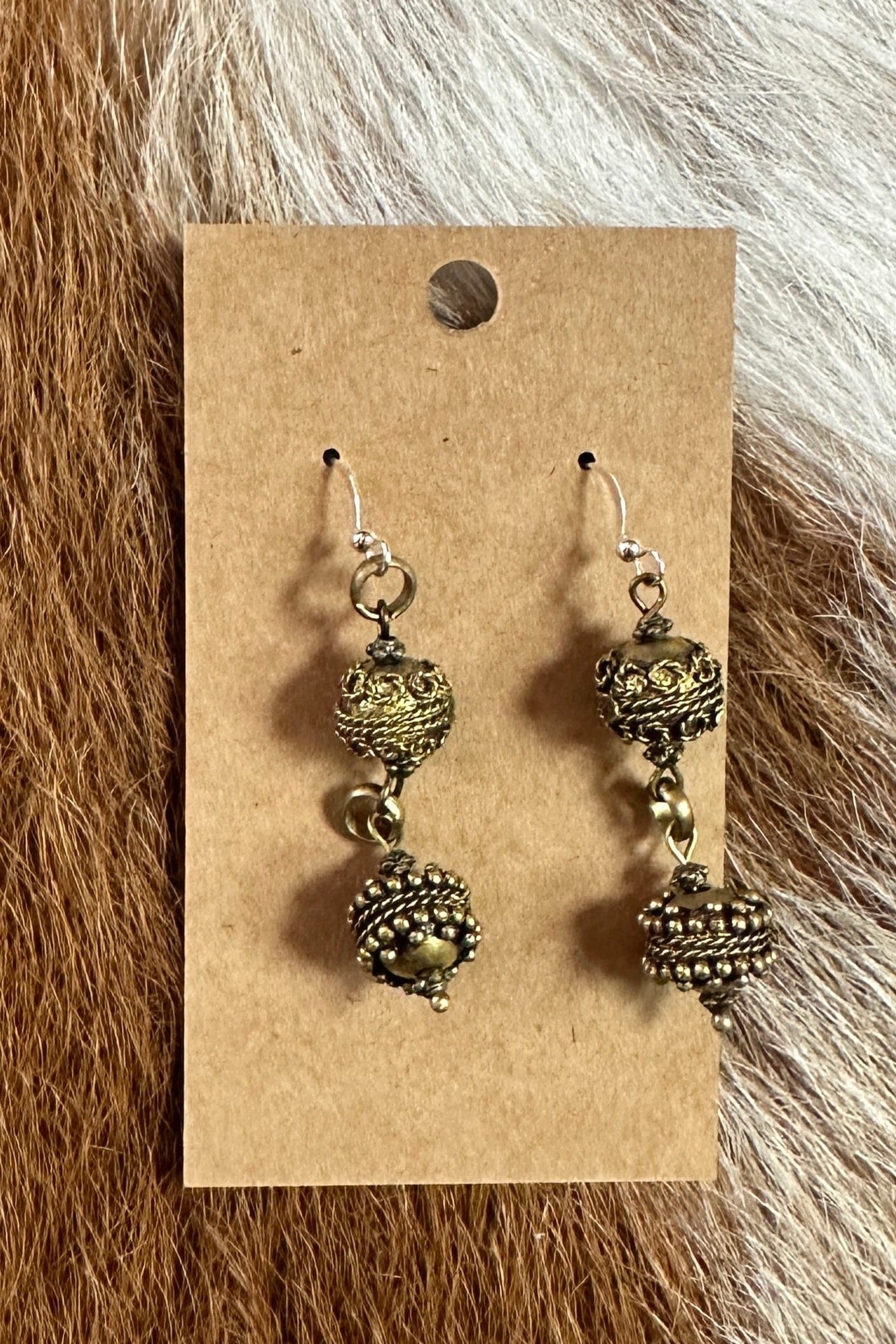 akear8 earrings on display