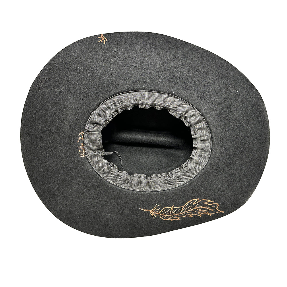 Black hat underside with feather detail