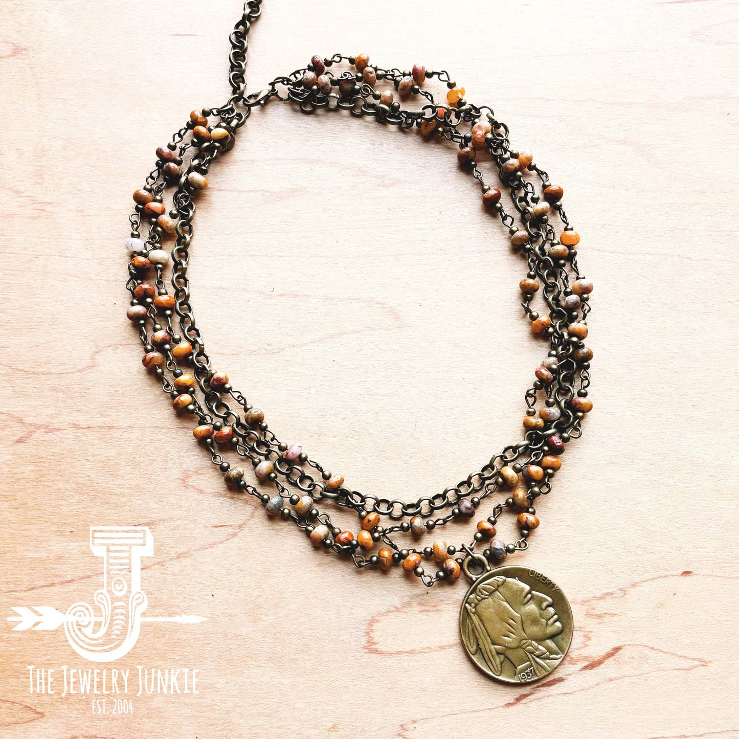 Necklace with beads and pendant.