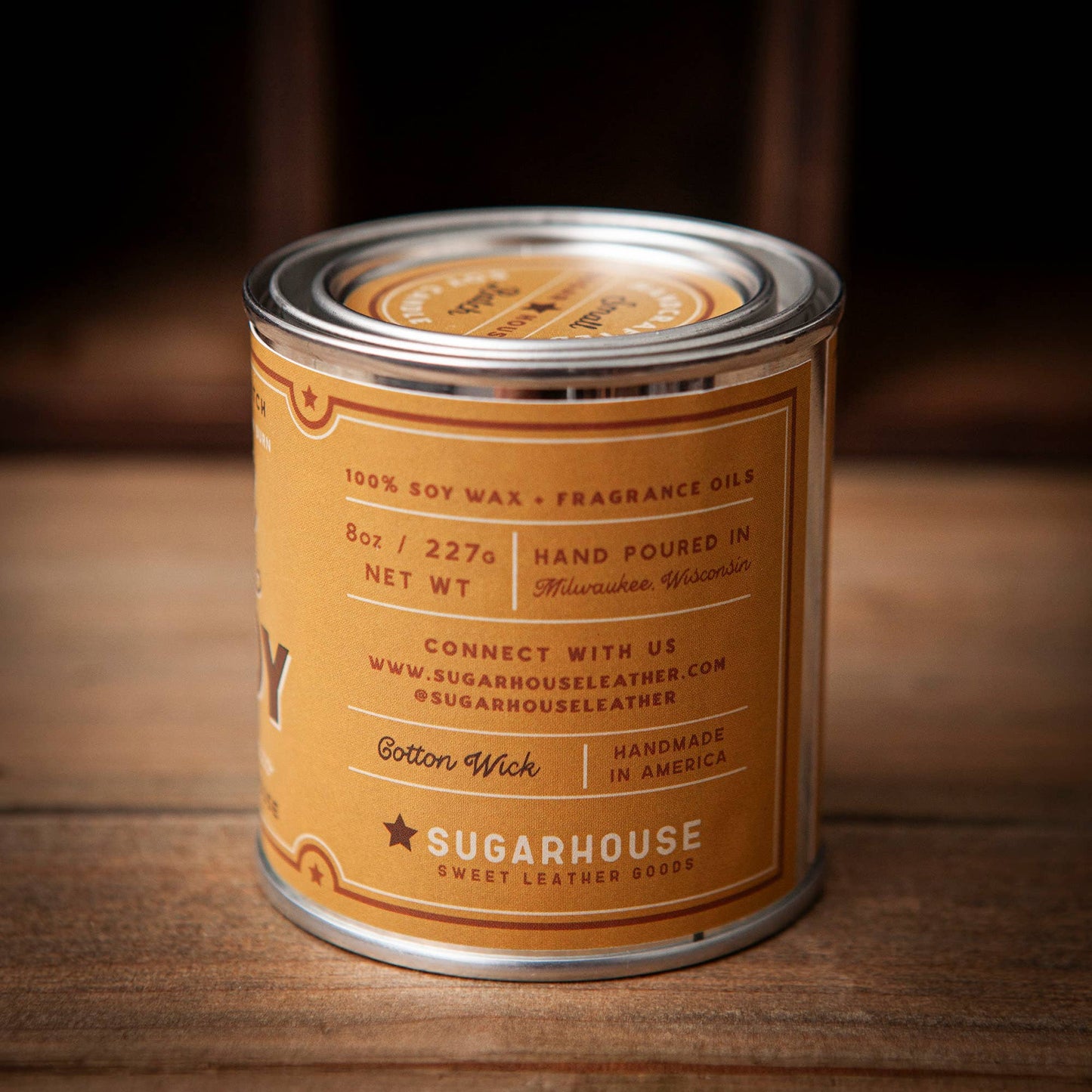 Soy wax candle in a tin.