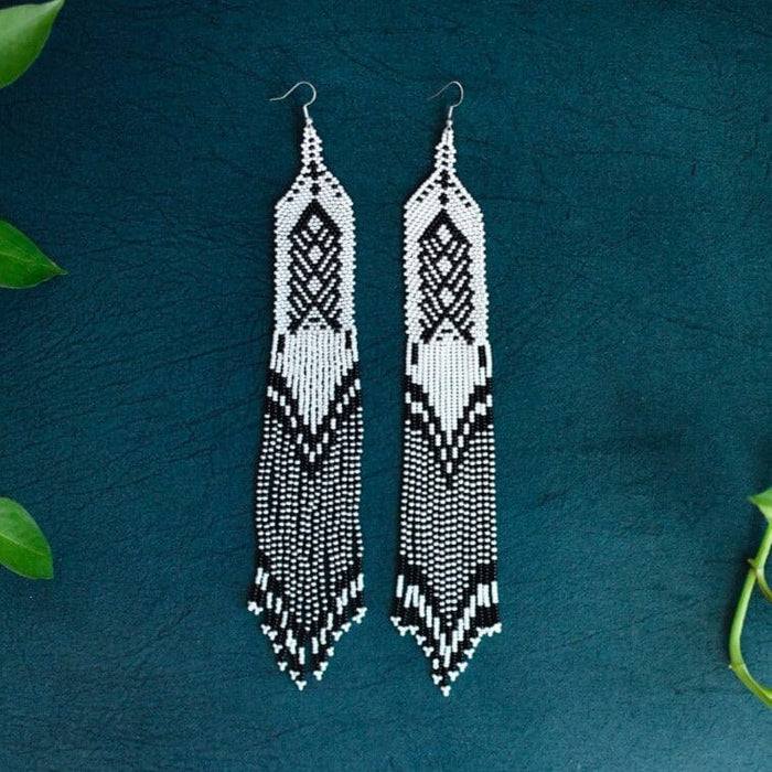 Cascadas Mother Sierra earrings, black and white beaded dangle.