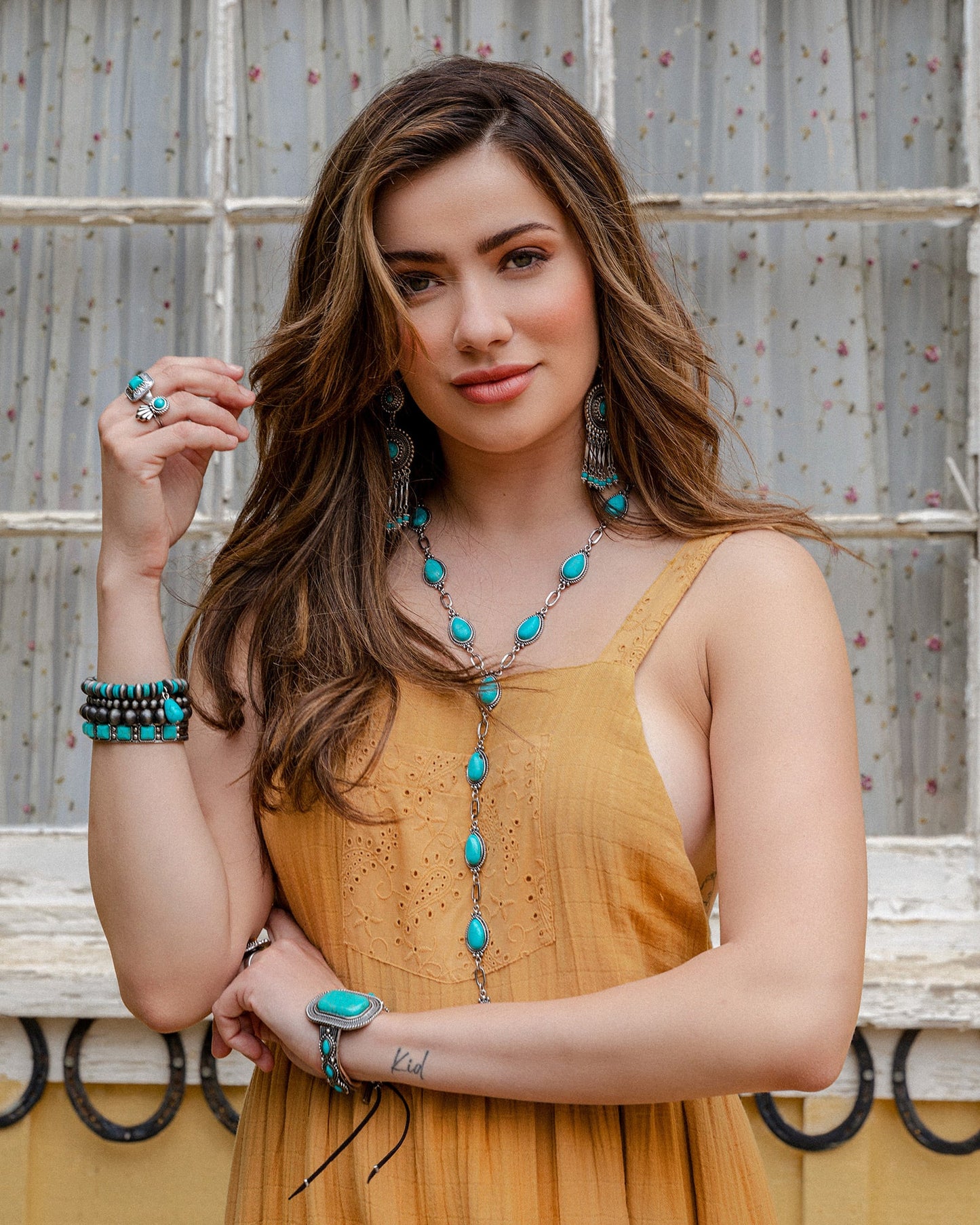 Woman wearing turquoise jewelry, cccuf92-cccuf119, ccerr74, ccrng52-69, ccnec80