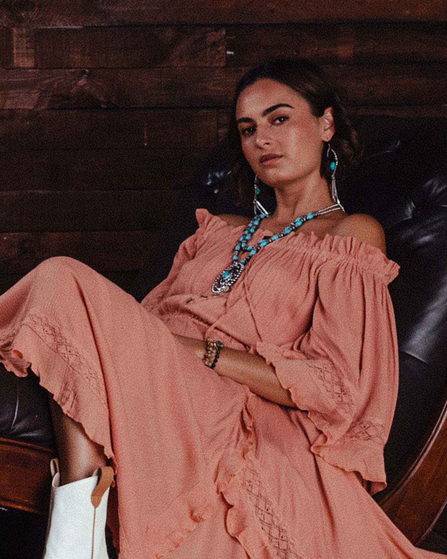 Woman in coral dress, lifestyle photo
