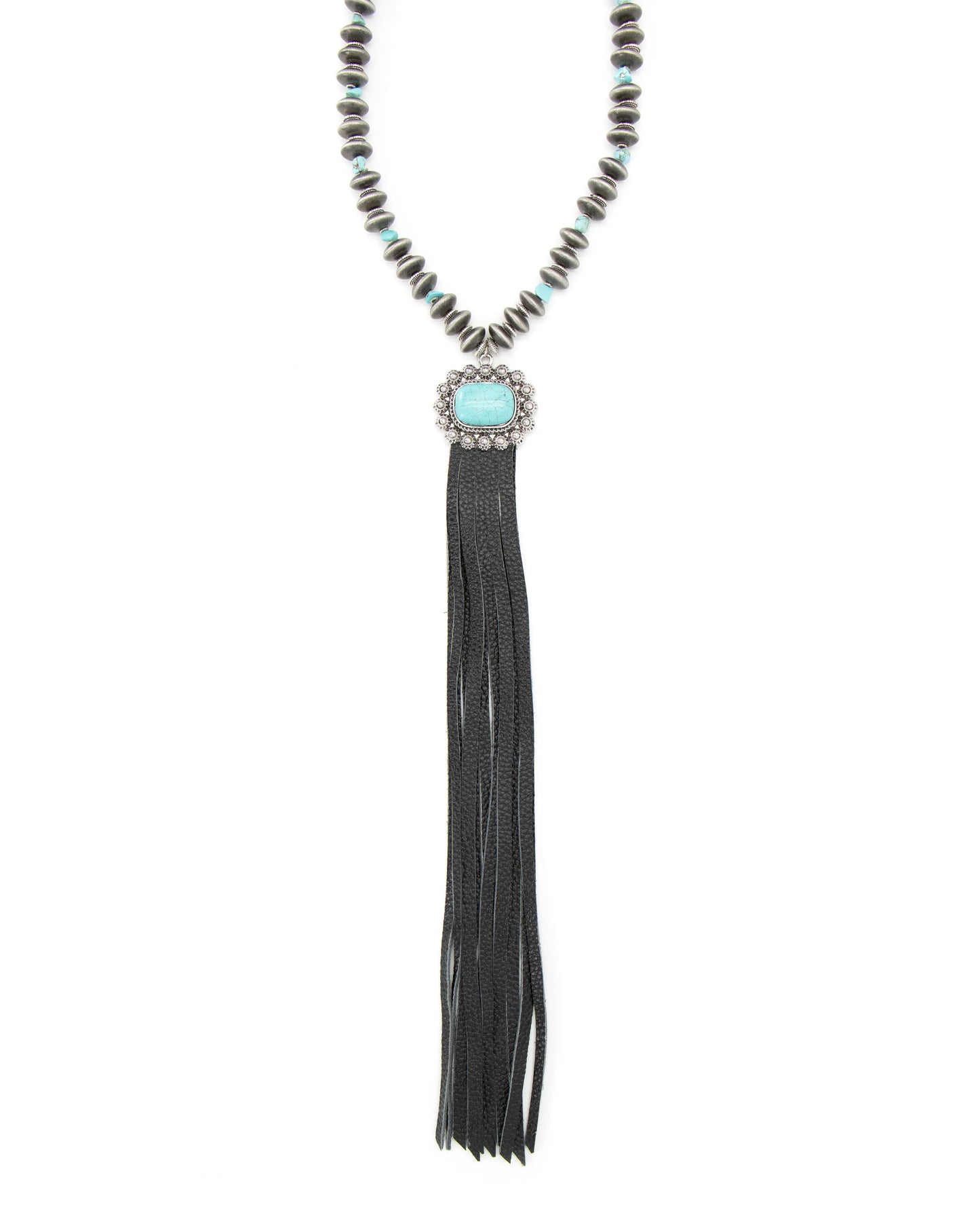 Close-up of beaded necklace with turquoise pendant and black tassel.