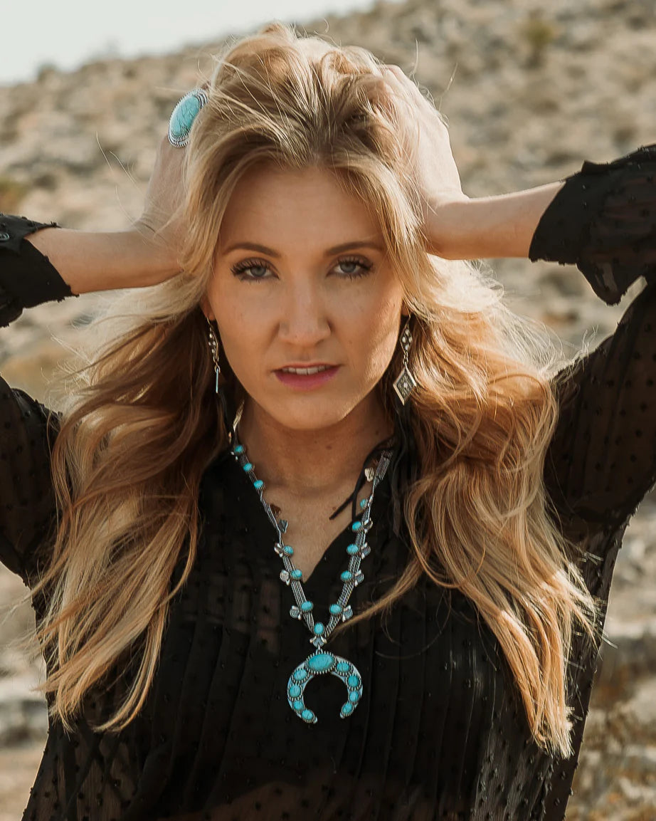 Woman with turquoise jewelry, lifestyle image