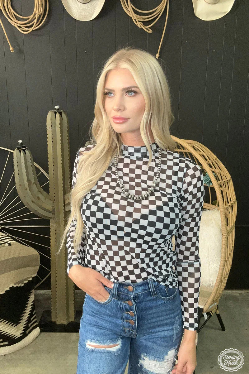 Woman in checkered top