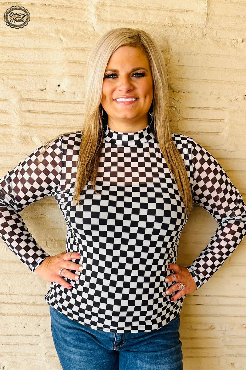 Woman in checkerboard top