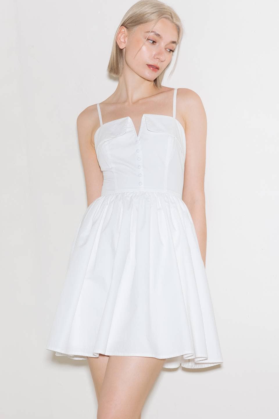 Woman in white sundress.