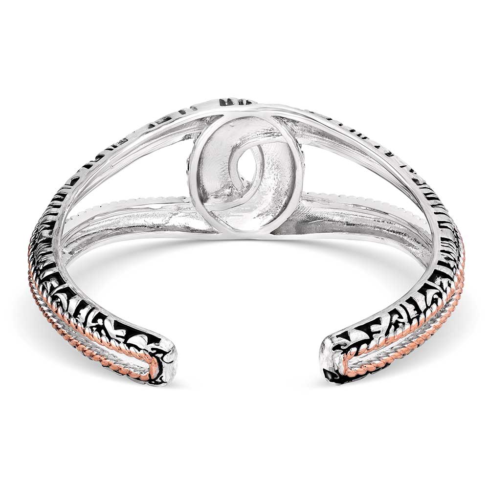 Silver cuff bracelet with intricate design