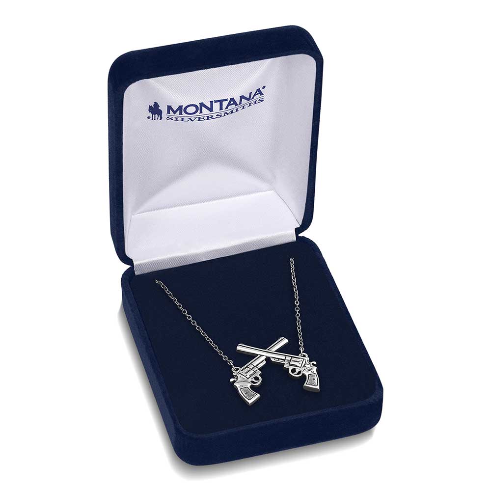 Montana Silversmiths pistol pendant necklaces in a box