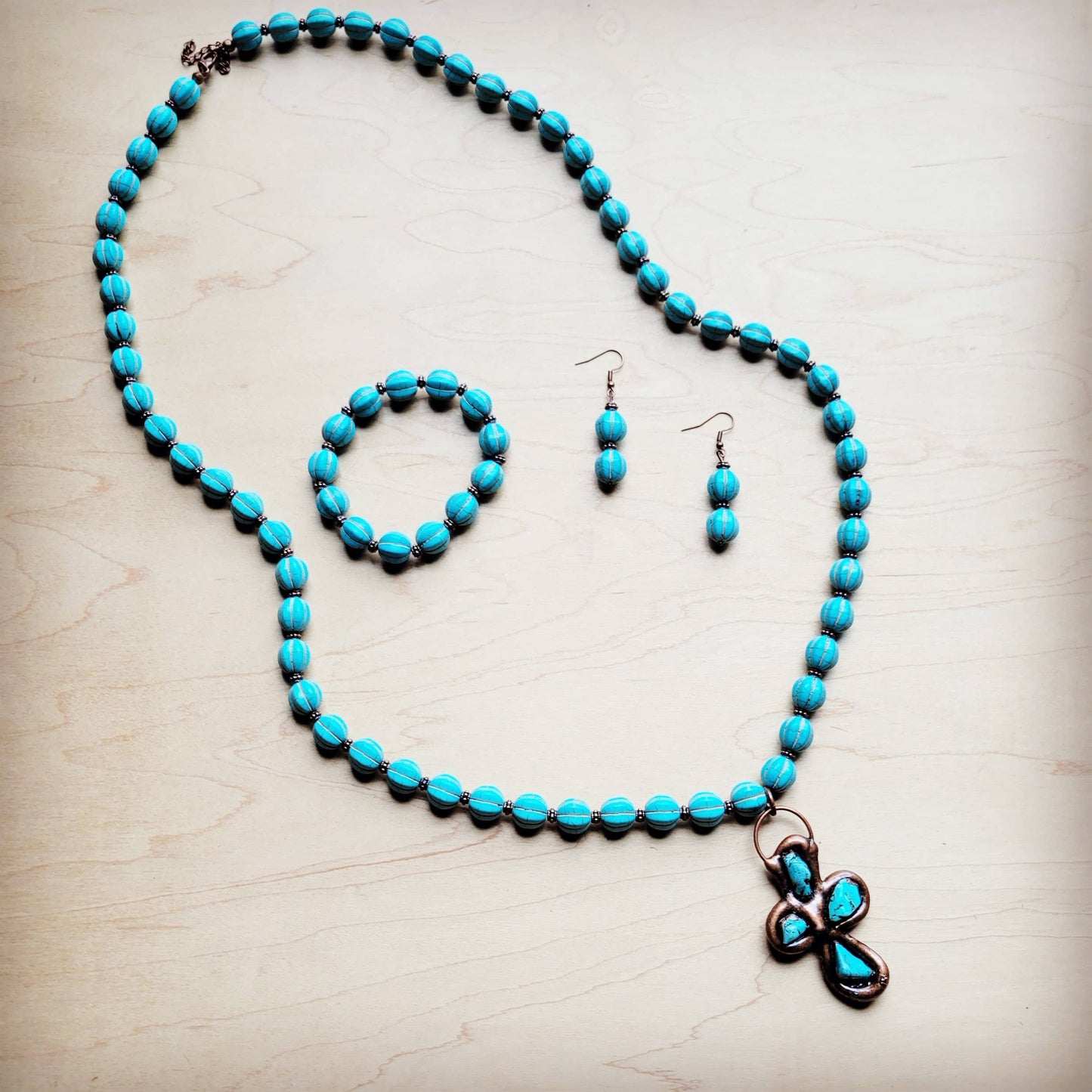 necklace, bracelet, and earrings.
