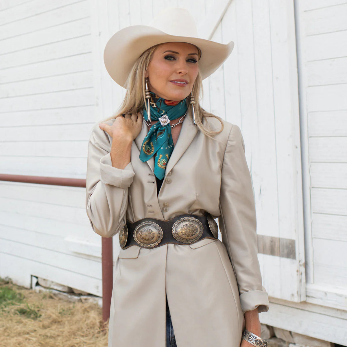 Woman in vintage western wear with fringe scarf