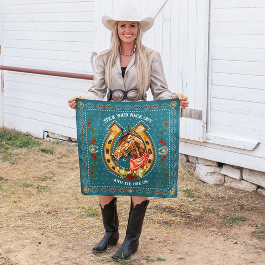 Cowgirl holding vintage horse wild rag scarf.
