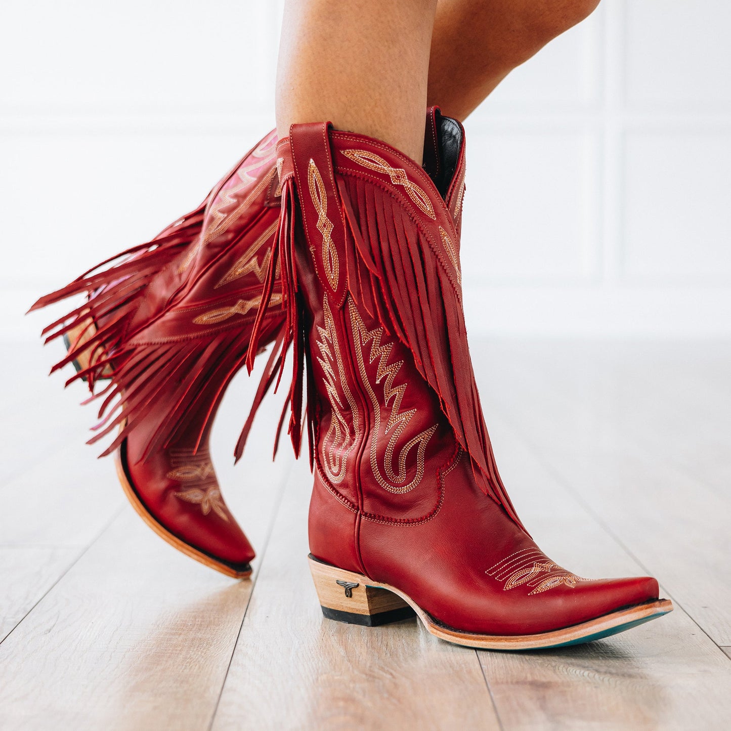 Red Senita Falls cowboy boots with fringe