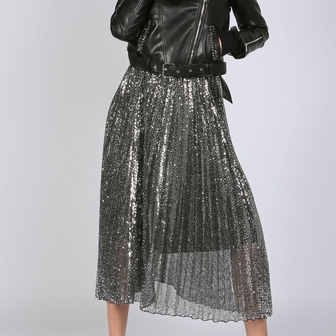 Black sequin skirt with leather jacket
