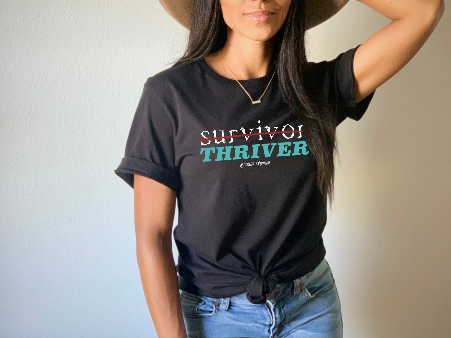 Woman wearing Survivor Thriver shirt