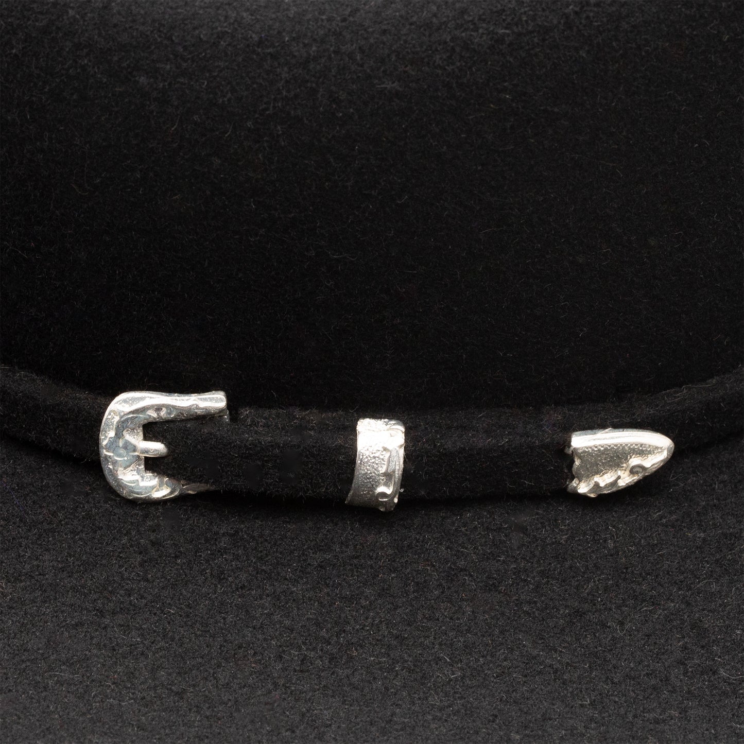 Black hat with silver buckle detail