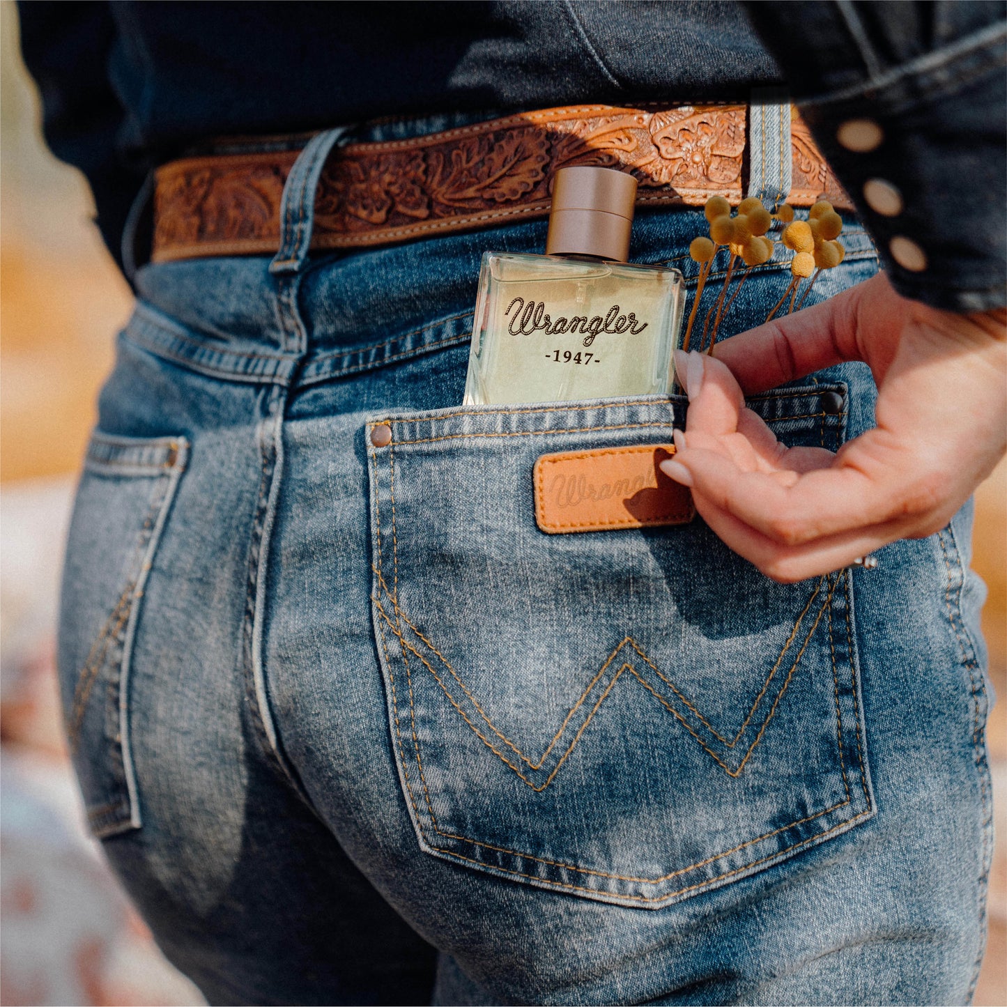Wrangler jeans with perfume bottle in pocket, 1947 logo