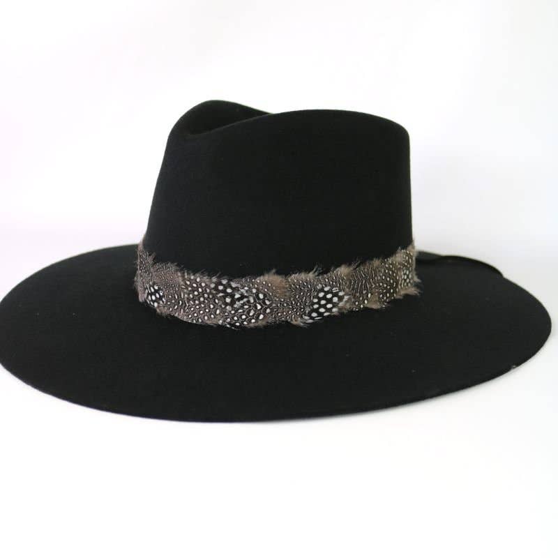 Black hat with feather band.