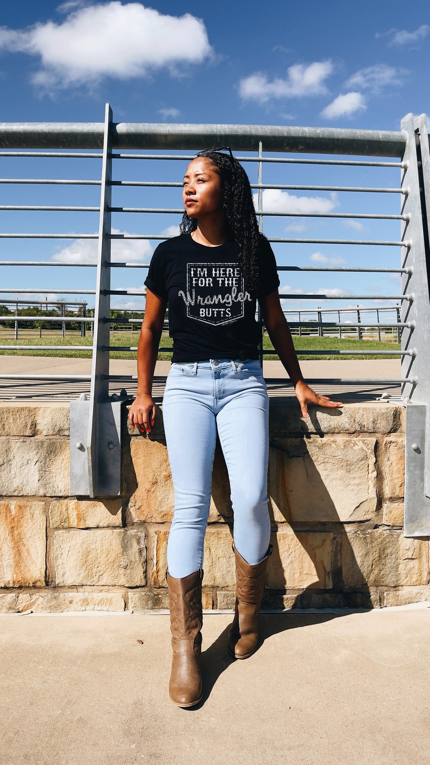 Woman in Wrangler jeans and Wrangler Butts tee