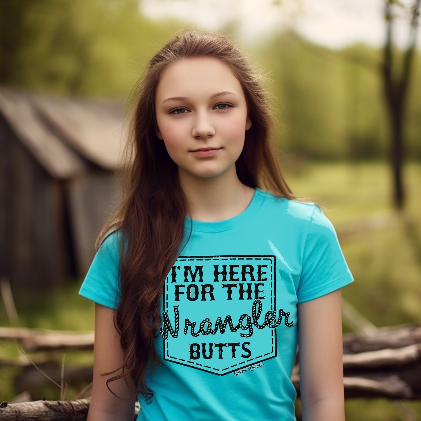 Girl in Wrangler Butts turquoise shirt