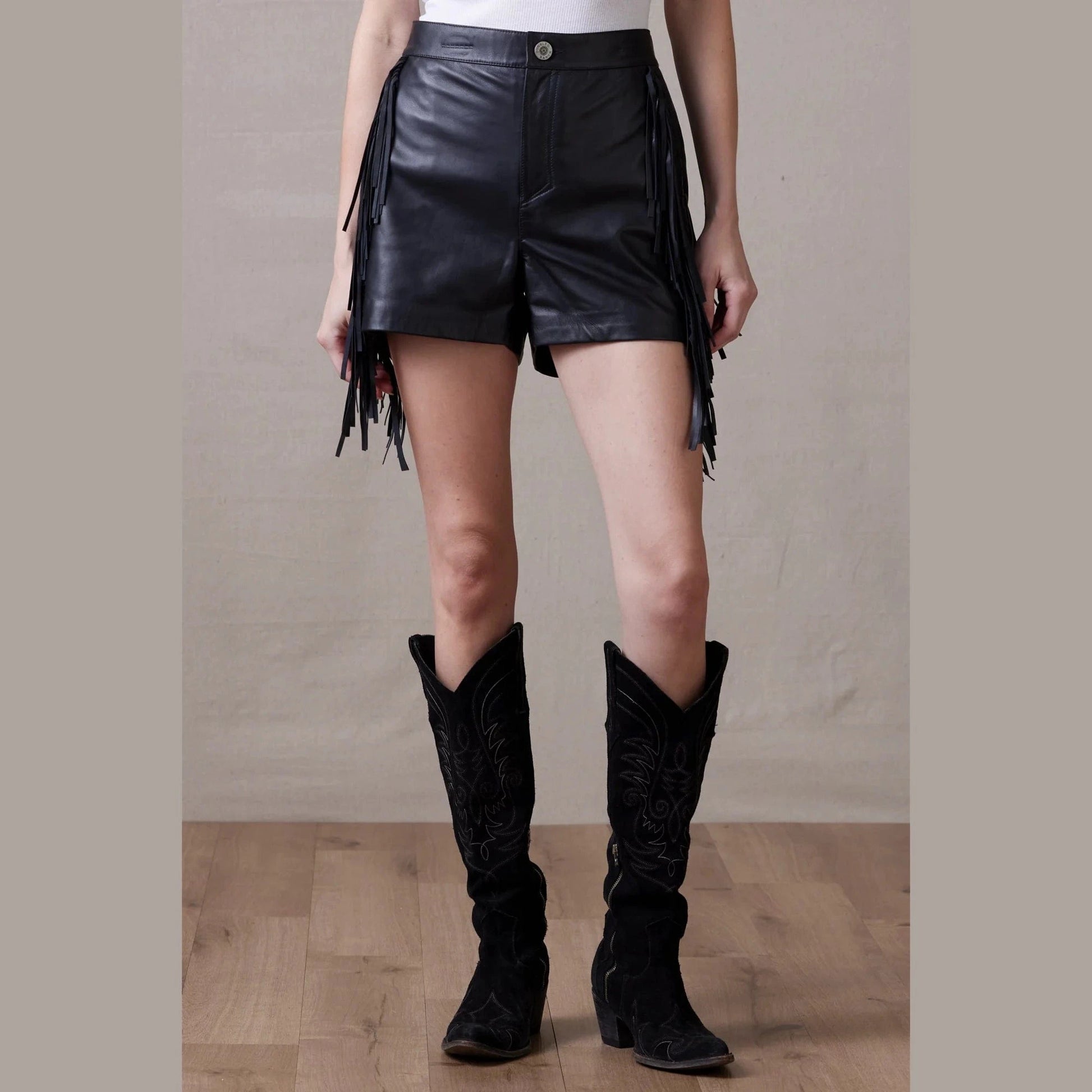 Sonora Short leather shorts with fringe and black cowboy boots