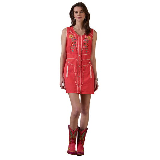 Woman in embroidered red dress and boots