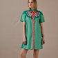 Green Just Wing It dress with embroidered detail