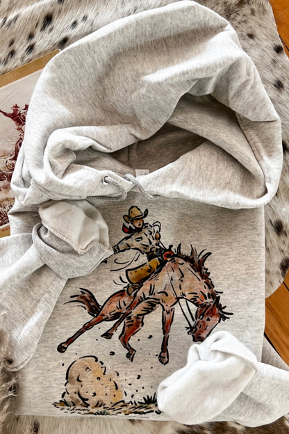 Gray hoodie with cowboy graphic.