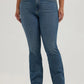 Woman in blue jeans.