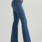 Woman wearing blue flared jeans.