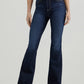 Woman wearing dark wash flare jeans.