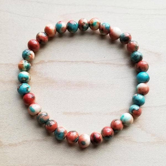 Beaded bracelet with red, blue, and white beads.
