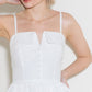 Woman in white sundress.
