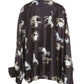 Black shirt with white animal print.