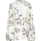White button-down shirt with horse print.