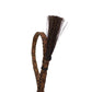 Braided horsehair with frayed end.