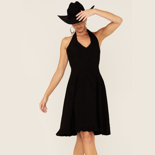 Woman in black dress and cowboy hat, 356G29