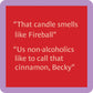 Red square with text about a candle smelling like cinnamon.