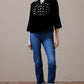 Daughter of the Moon Top, women's black embellished top and jeans.